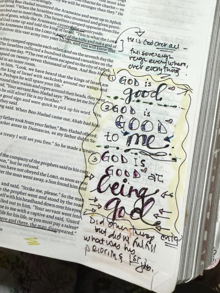 Handwritten religious quote about God's goodness and being at peace, with colorful highlights and annotations on a journal page.