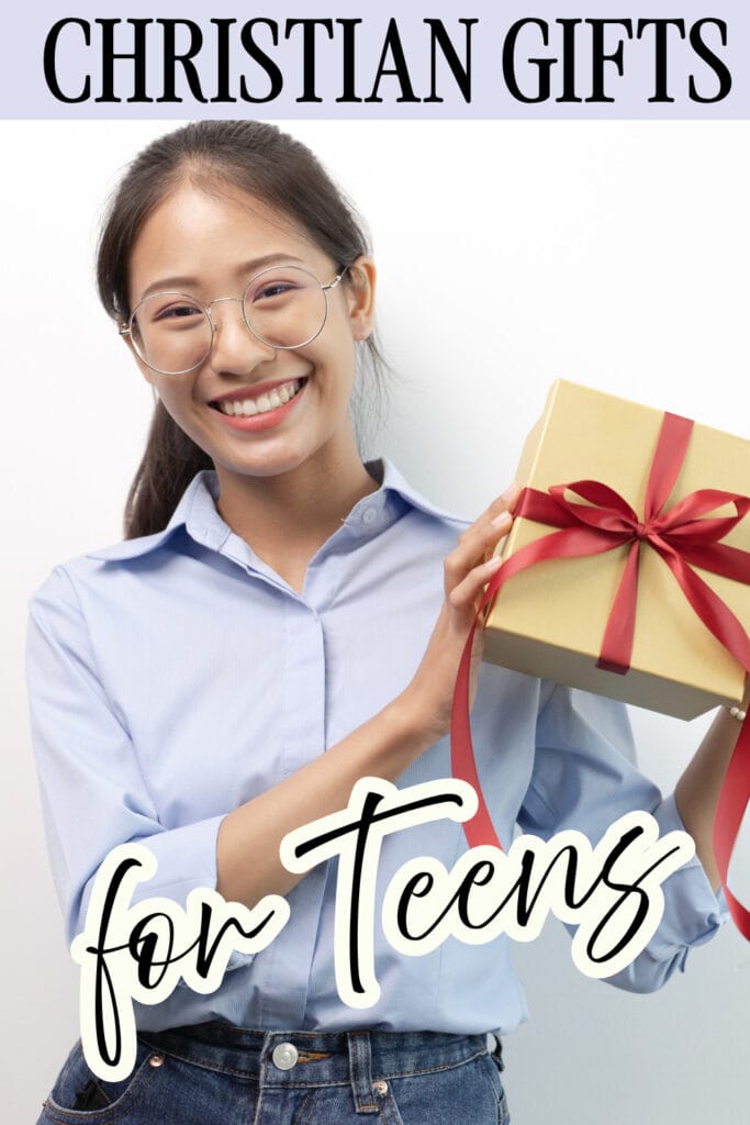 Smiling teen girl holding a gift box wrapped with a red ribbon, promoting Christian gift ideas for teenagers on a website about Christian gifts.